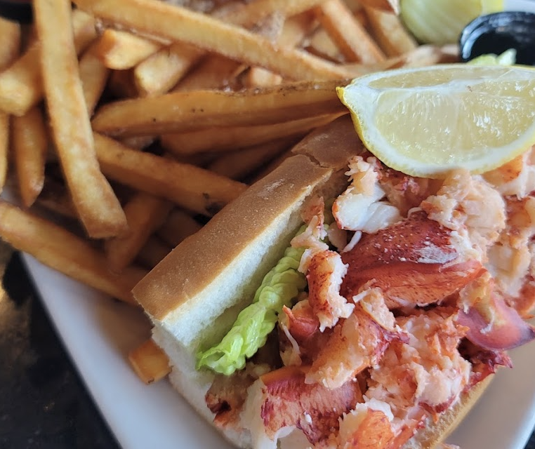 The Preserve at 405 signature dishes Chicken RiggiesLobster RollHot Lobster Sandwich